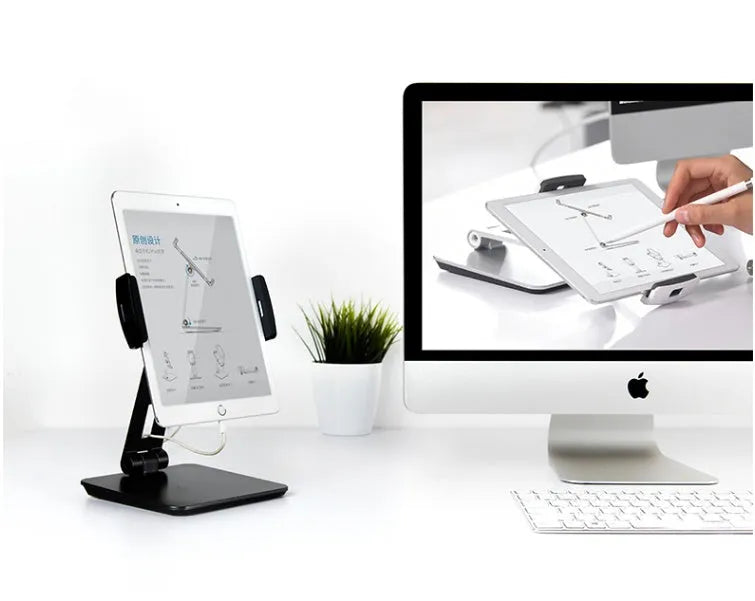Foldable aluminium desktop phone and tablet holder in silver showing 360-degree rotation