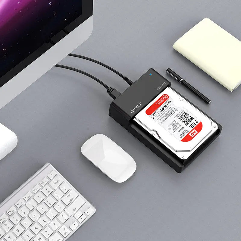 Black plastic hard disk box for 2.5 and 3.5 inch SATA drives with included data cable
