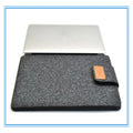 Clamshell laptop bag in khaki with woven plush exterior, shown open to reveal tablet felt liner and corner protector