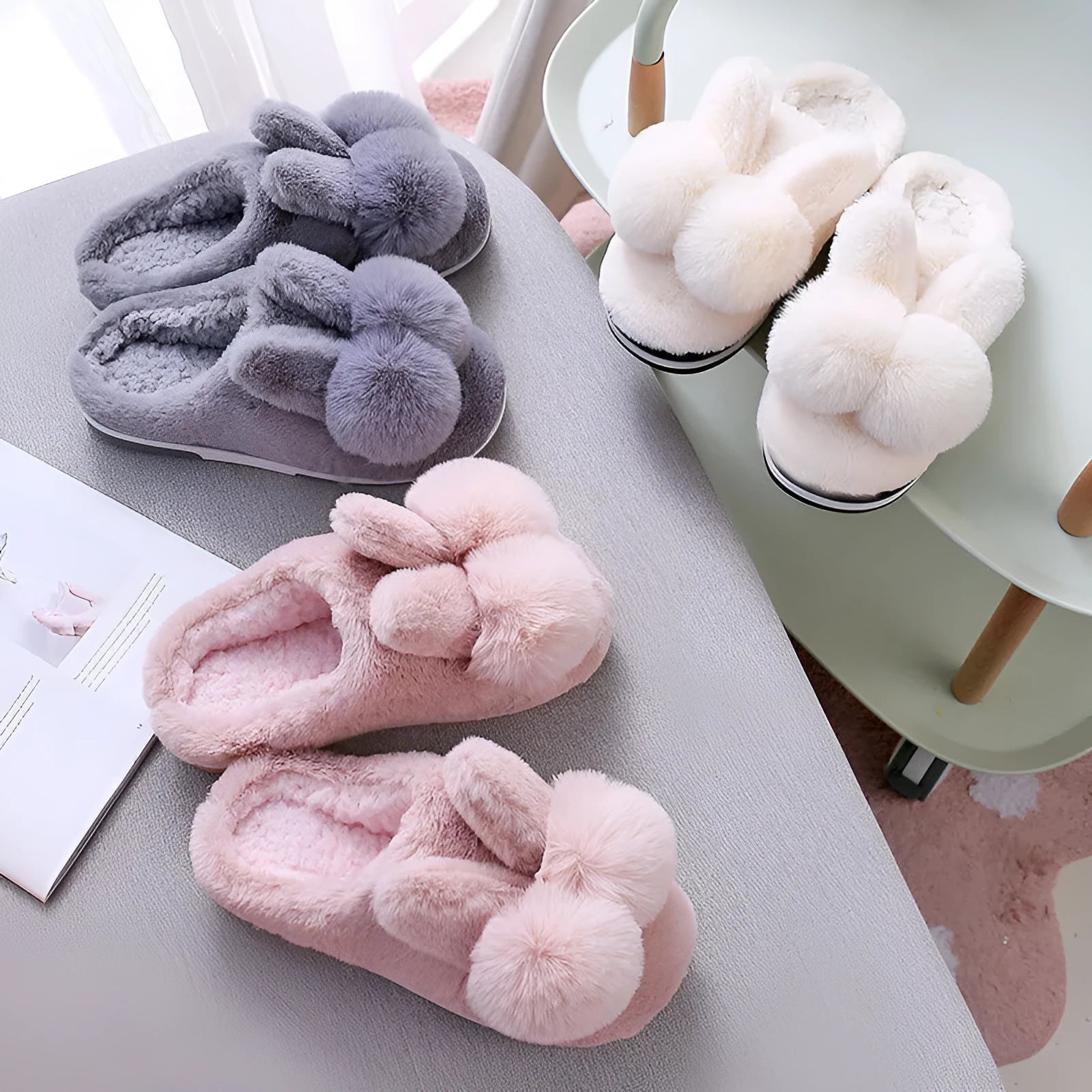 Women's fluffy bunny slippers in creamy white with a high rabbit fur upper and decorative flowers.