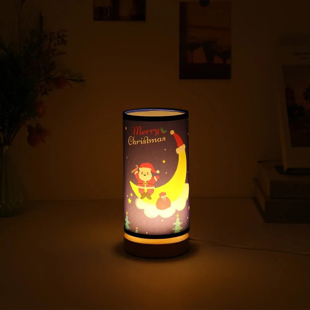 Moon-shaped Santa Claus LED night light with a bamboo base and a white USB plug.