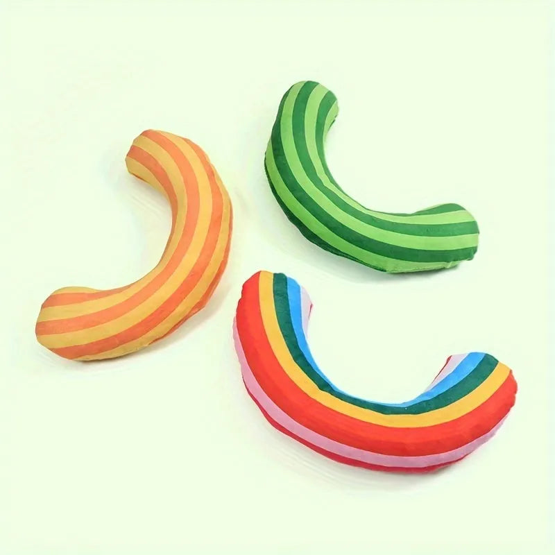 Striped pattern cat pillow toy in green, rainbow, or yellow, showing dimensions of 23cm by 20cm.