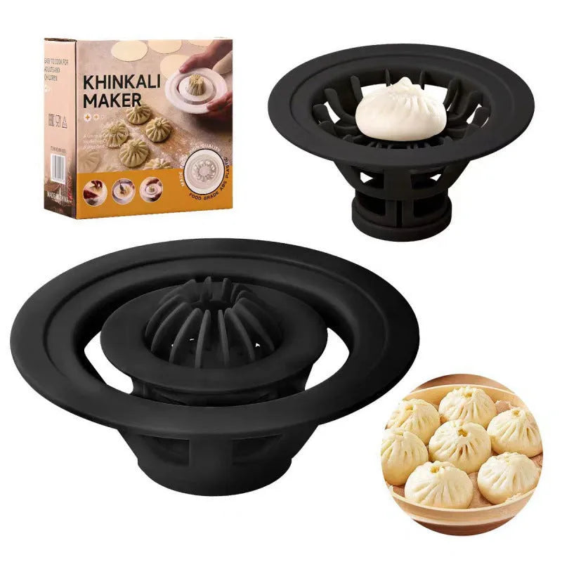 Black Jinkali set of four plastic steamed bun moulds for shaping dumplings and baozi on a kitchen worktop.