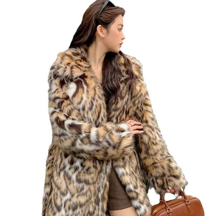 A street-fashion faux fur coat with a fox print pattern and a fur collar, shown in a long style.