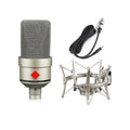 Champagne gold wired condenser microphone with cardioid pattern on included stand.