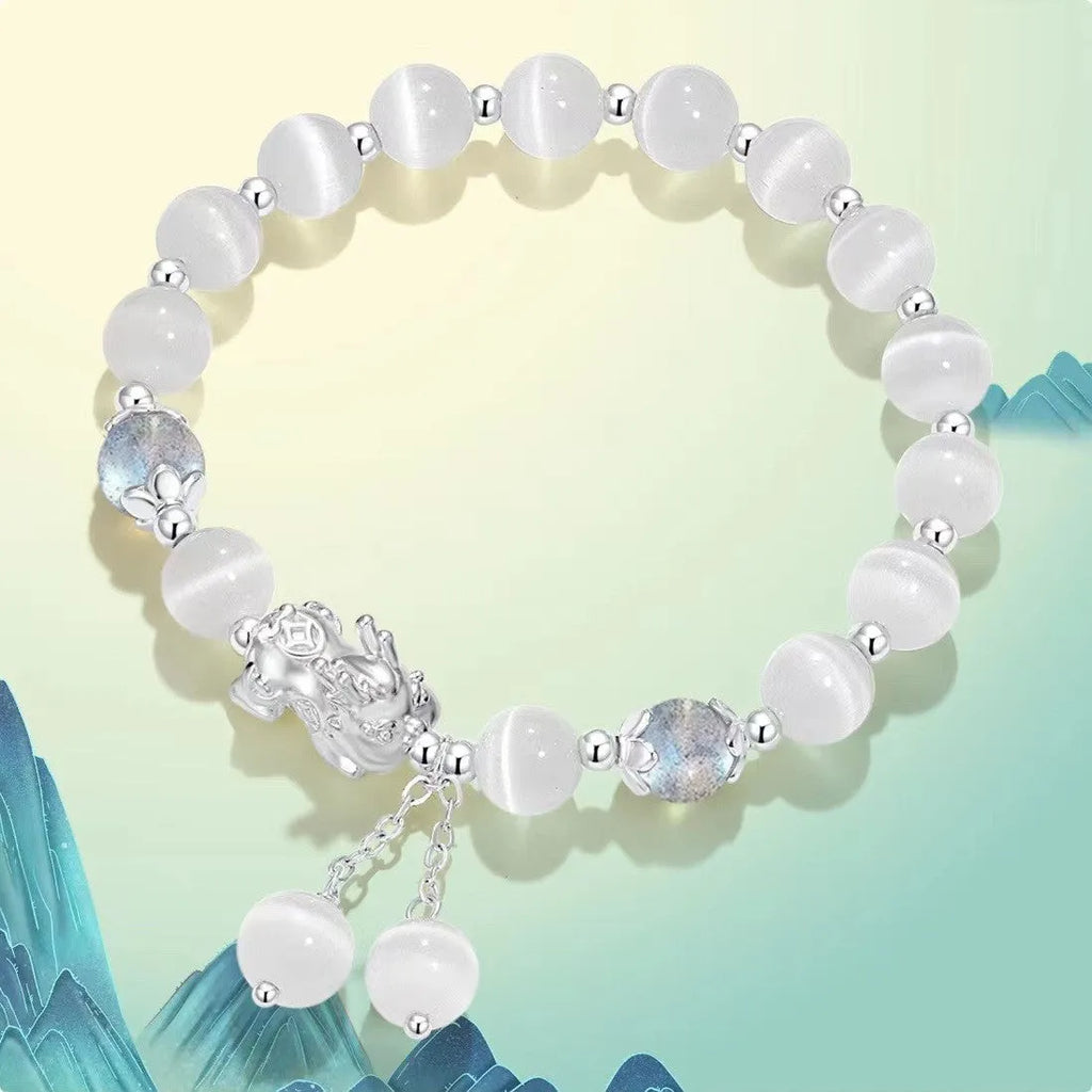 Natural black agate wave-shaped couple bracelet with money painting design on gray background
