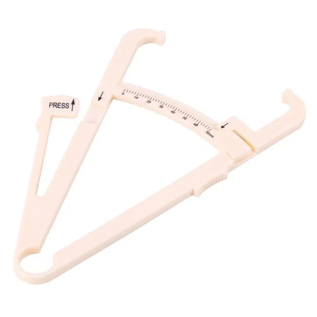 Clear acrylic skin fold fat caliper for body fat measurement showing measurement scale.