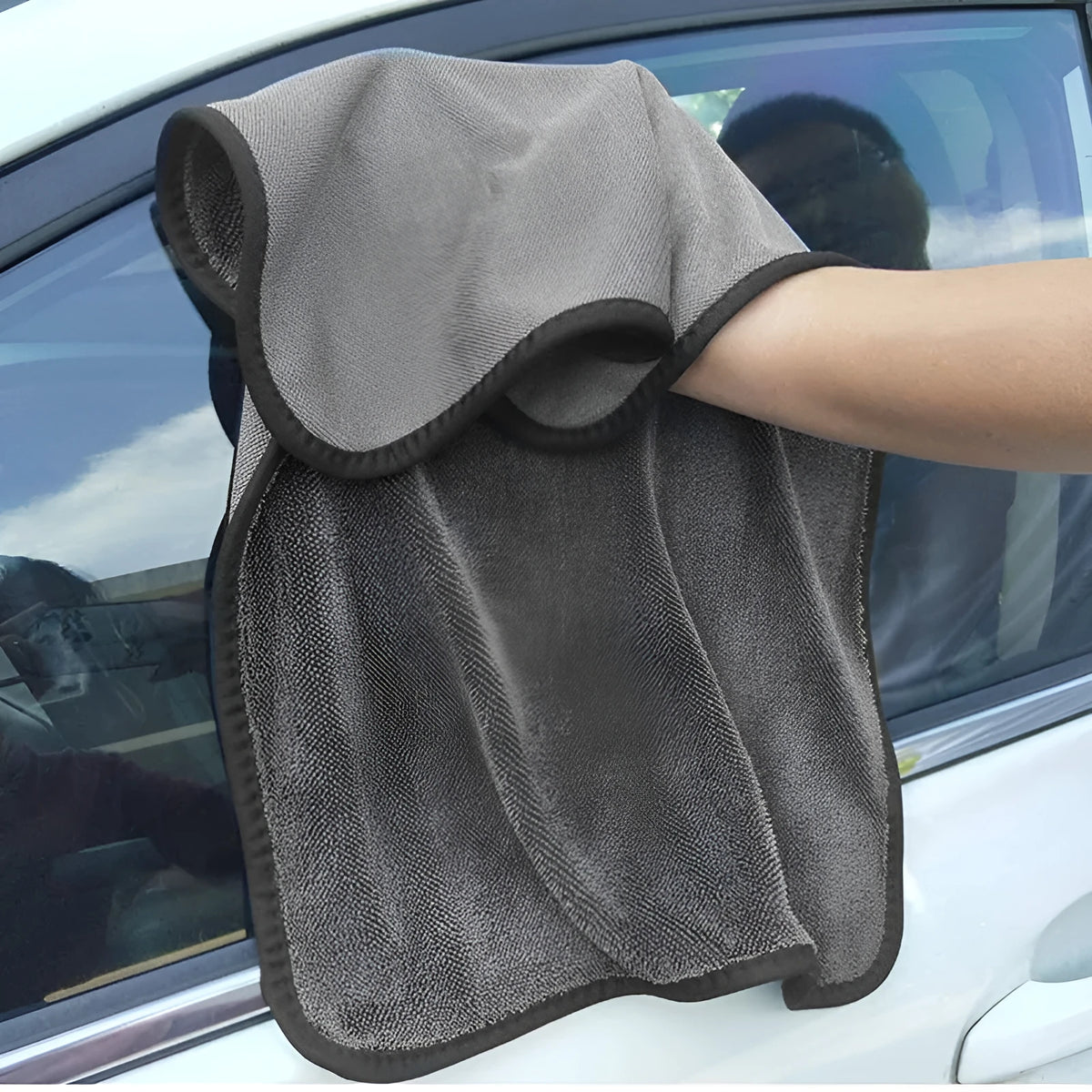 Grey 40x40 centimetre microfiber car wash and drying towel laid flat