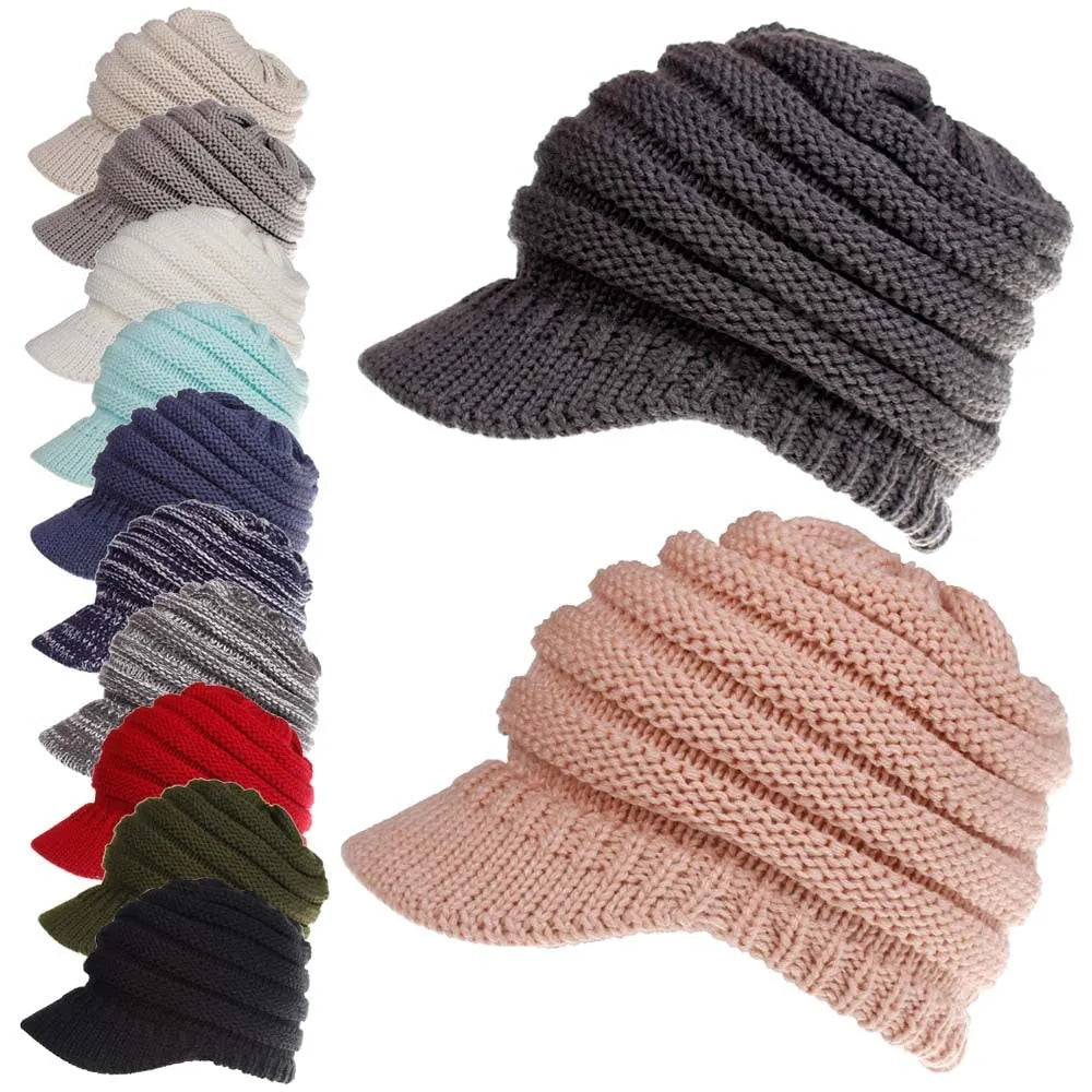 Women's soft acrylic ponytail beanie hat in various colours on a model with a ponytail.
