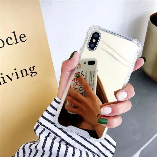 Mirror phone case for iPhone showing reflective back surface and soft TPU edges in multiple colour options.