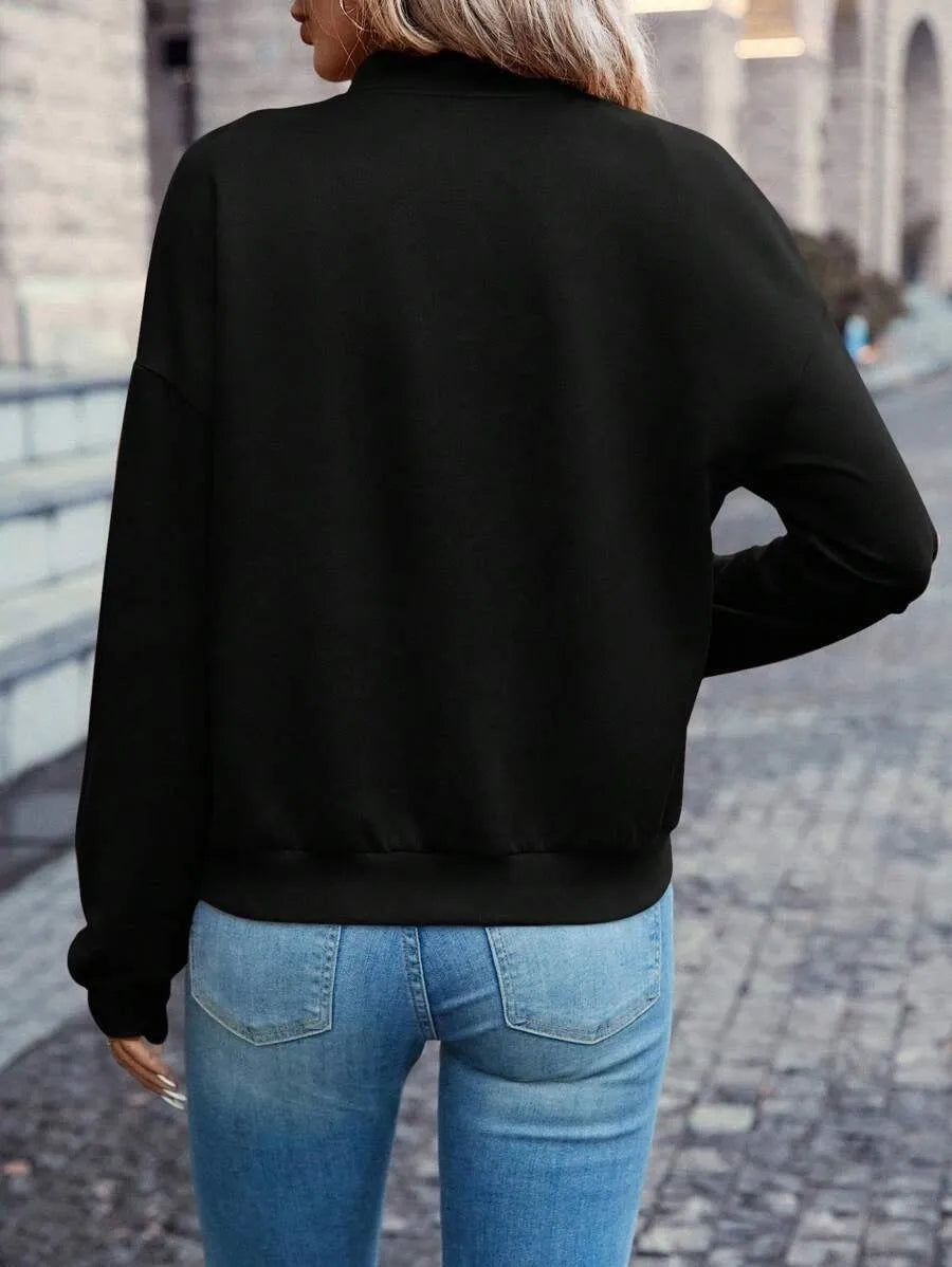 Black women's zip-front casual jacket with long sleeves and faux pocket detailing