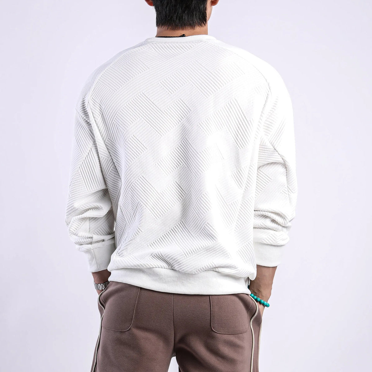 Men's twill jacquard long sleeve pullover sweater in loose fit with round neck
