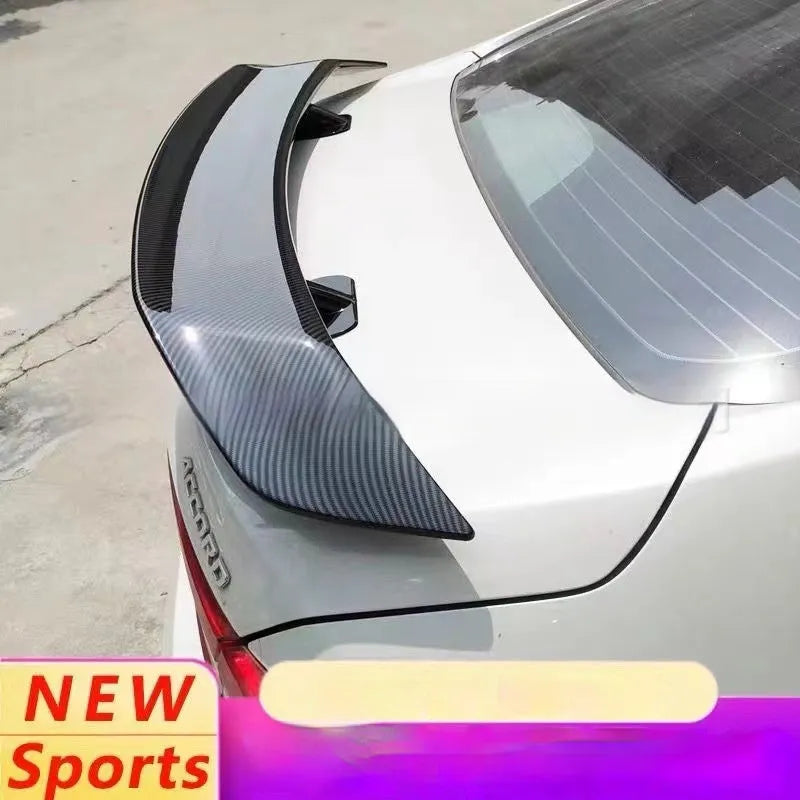A bright black punch-free ABS plastic tail wing spoiler for cars.