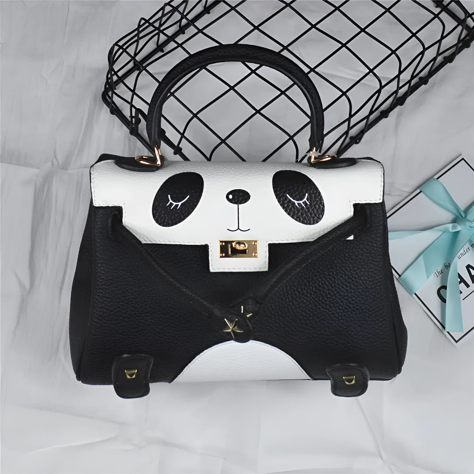 Panda animal print cow leather handbag in a horizontal square shape, shown in two size options.