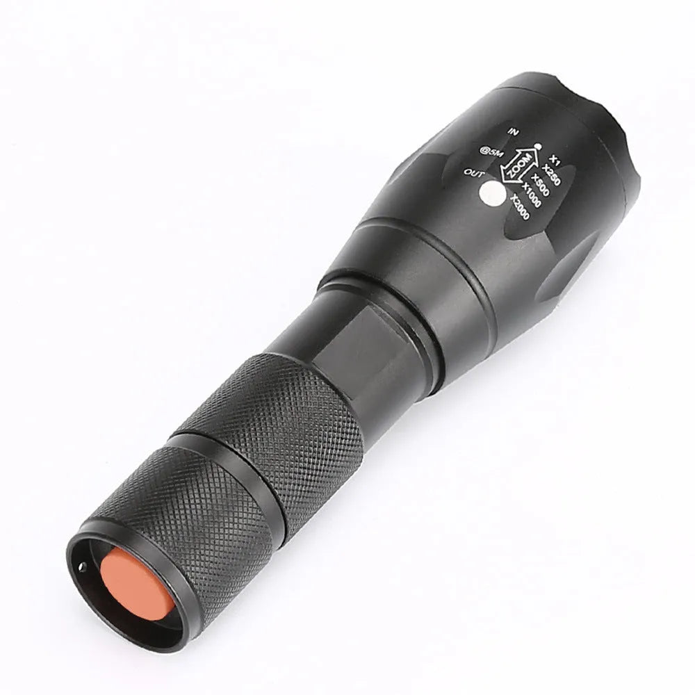 Black aluminium alloy zoomable LED flashlight showing adjustable head for focus control