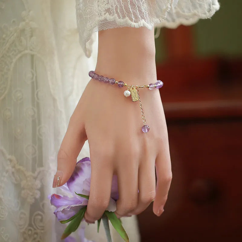 Natural lavender amethyst crystal bracelet with animal or zodiac motif for women.