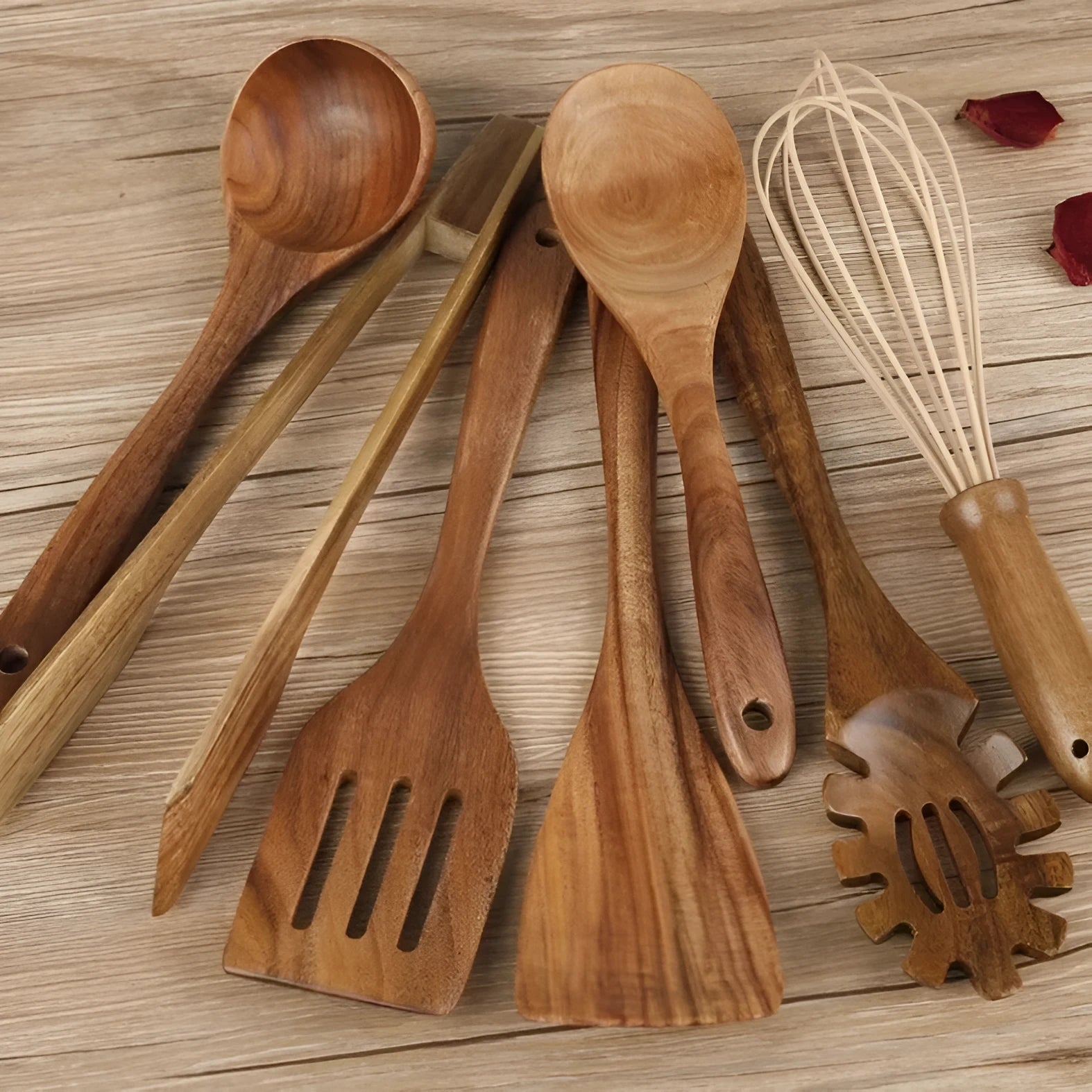 7-piece wooden cooking utensil set with natural wood finish including various spoon and spatula designs