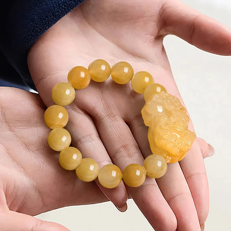 Carved jinsi jade money bracelet in golden thread colour with detailed bead sizing