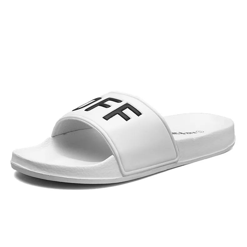 Large size men's black open toe slippers with a rubber sole, shown from the side.