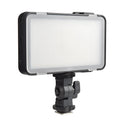 Shenniu M150 ultra-thin silver aluminium LED video light mounted on a mobile phone.