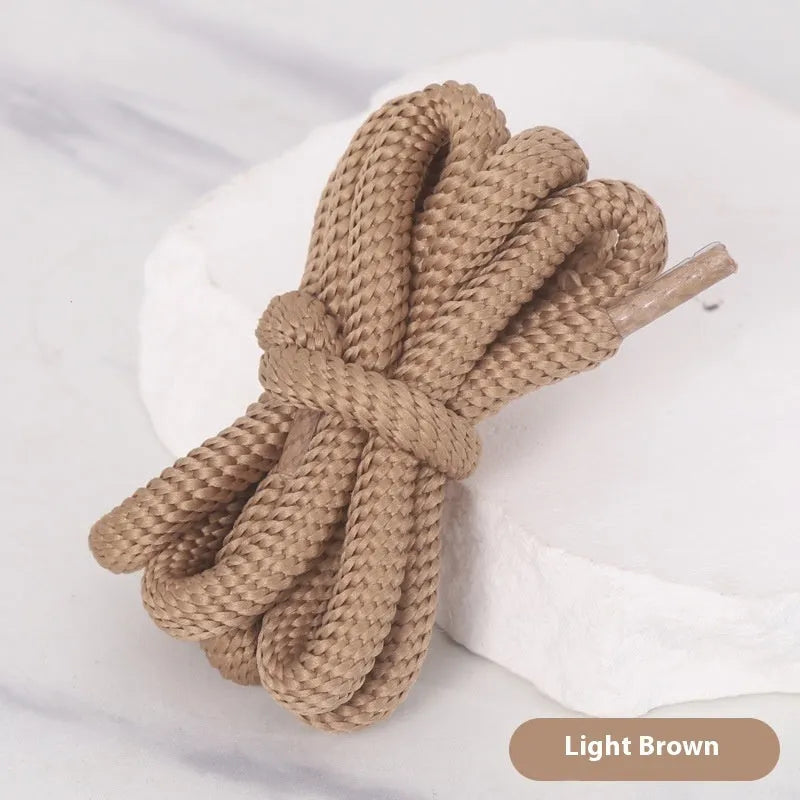 A pair of oval, round cross-section shoelaces in a chosen colour, showing the 1.0cm width.