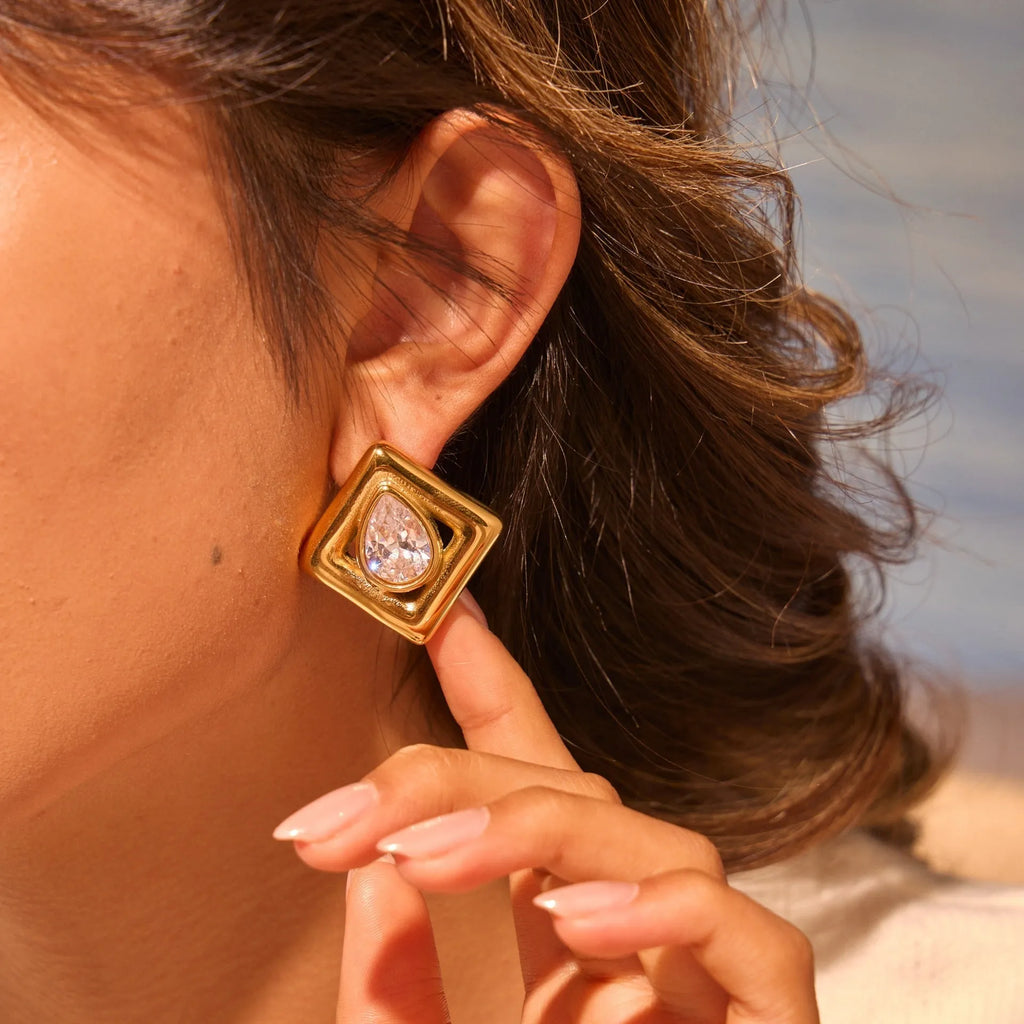 Gold geometric stud earrings with water drop zircon inlays on stainless steel with 18K electroplated finish