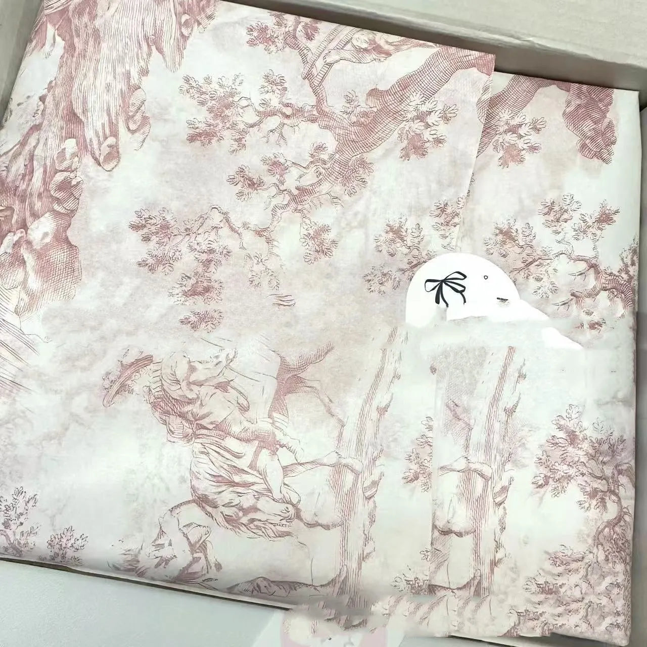 Pack of French MG tissue paper with retro floral print in pink purple and green purple colours, 50x70cm sheets.