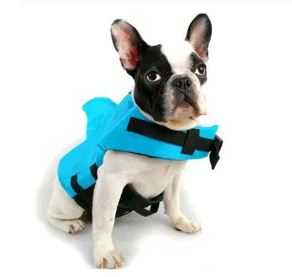 Shark-shaped dog life vest in blue or orange, cloth pet life jacket with buckle, sizes XS to XXL.