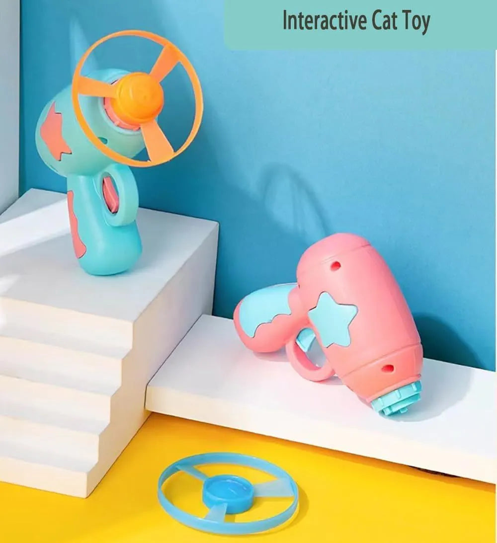 Blue interactive cat toy gun with spinning plastic frisbee for indoor cat chase play