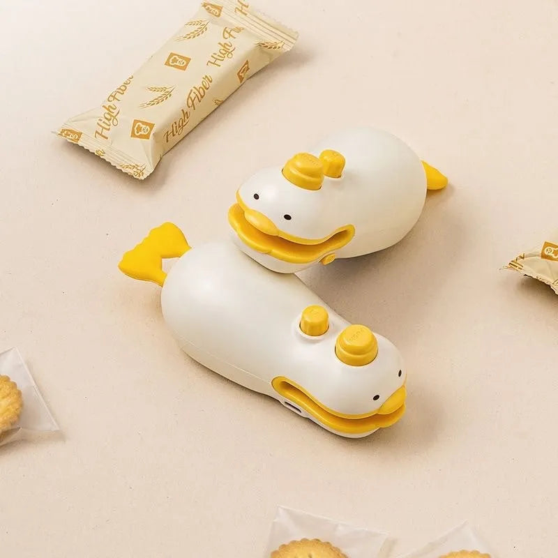 Small yellow duck rechargeable sealing machine with animal jacquard pattern and USB charging cable