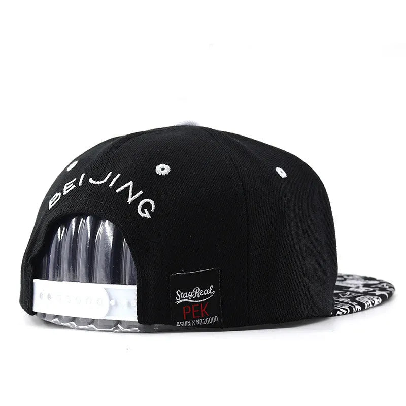 Adjustable cotton baseball cap in dome crown style, available in black and white colours