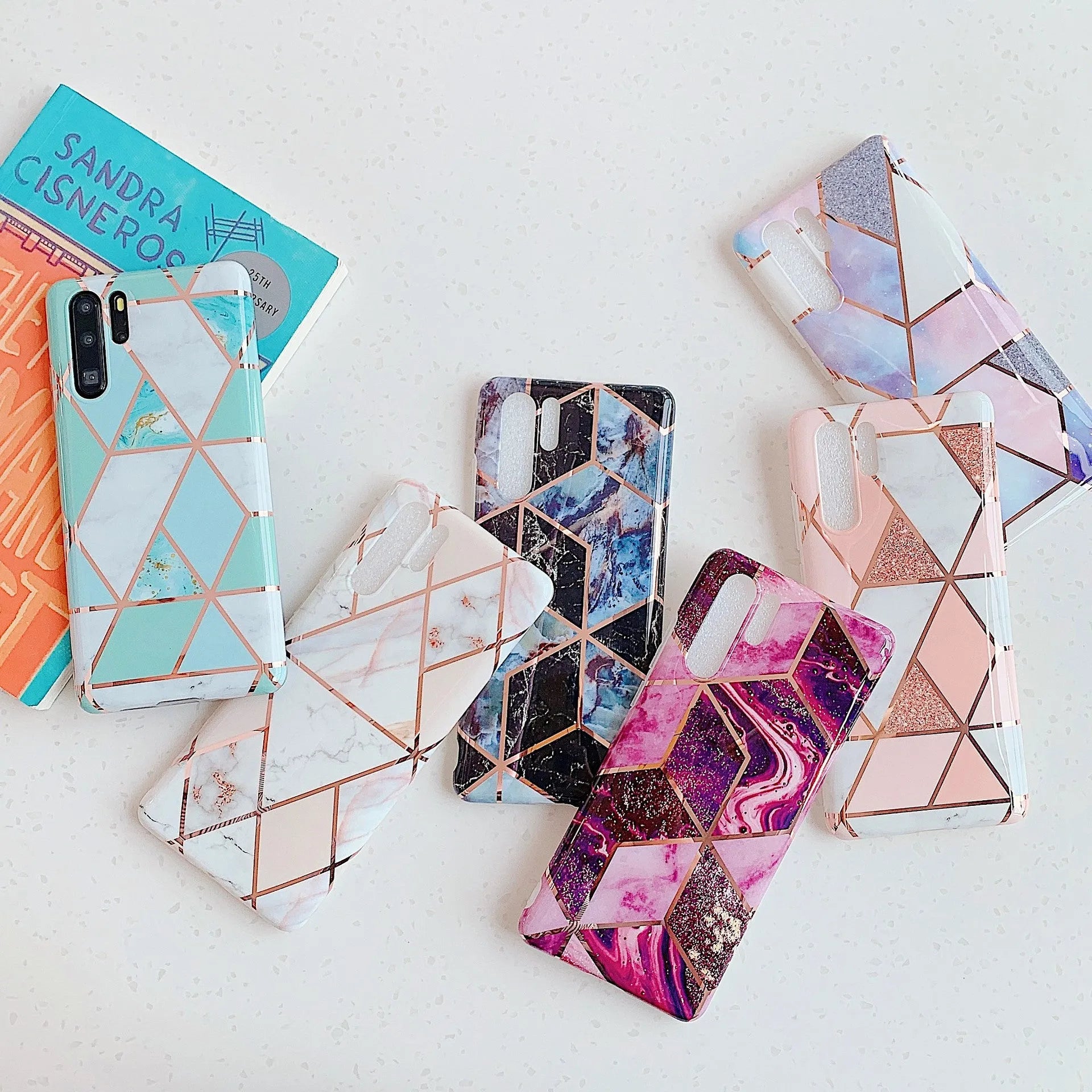 Electroplated marble pattern TPU phone case for Huawei and Samsung mobile phones in various colours.