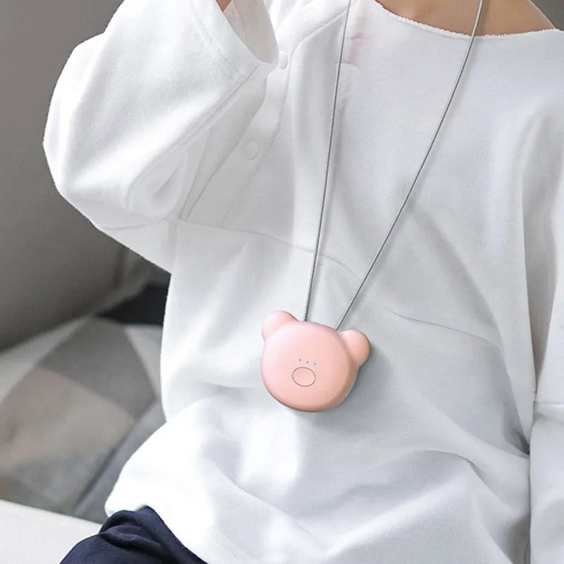 USB rechargeable wearable air purifier necklace in blue colour showing compact dimensions
