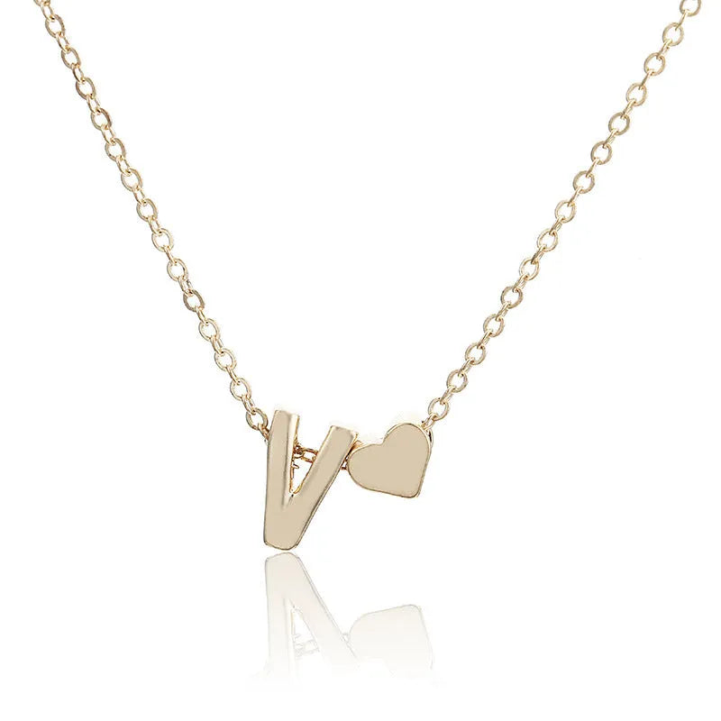 Peach heart shaped letter necklace pendant in alloy with gold and silver finish options