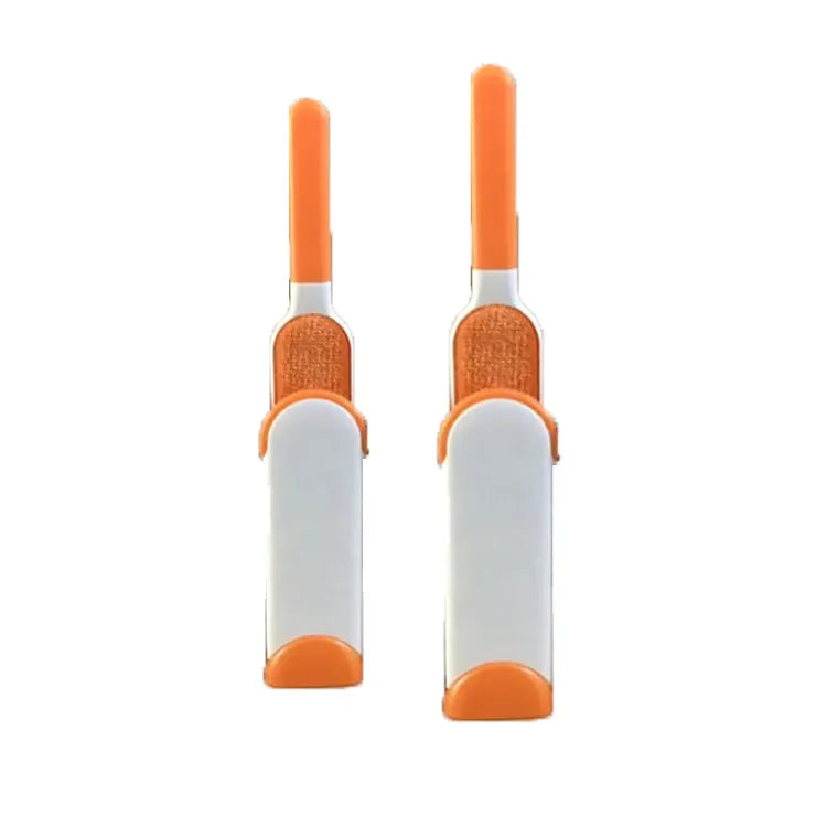 Blue reusable pet hair remover brush with self-cleaning base for removing fur from a grey sofa.