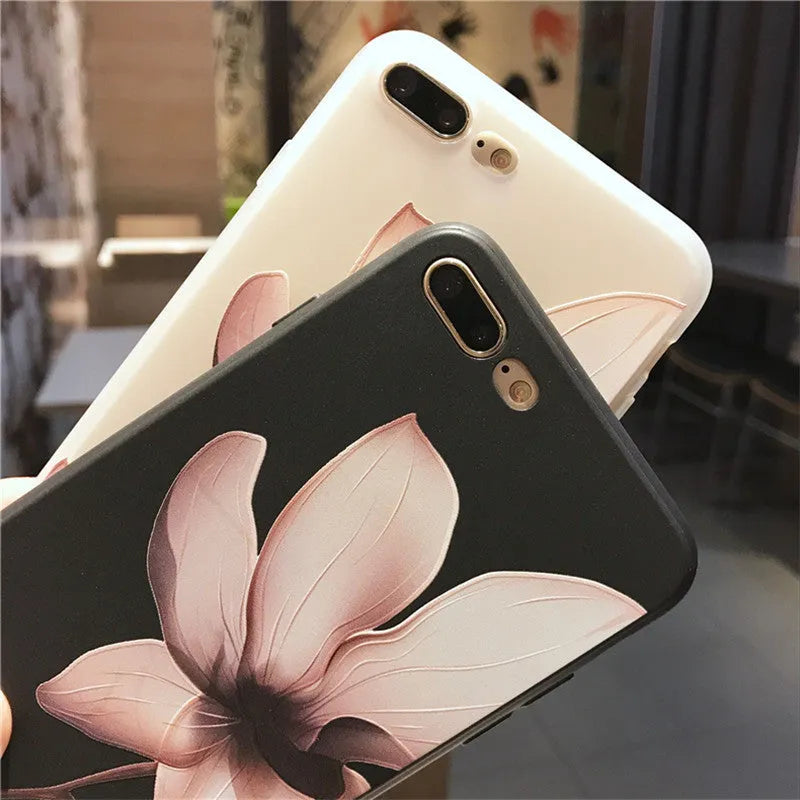 Embossed floral TPU phone case for iPhone in black and white colour options showing raised pattern detail