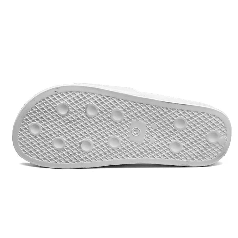 Large size men's black open toe slippers with a rubber sole, shown from the side.