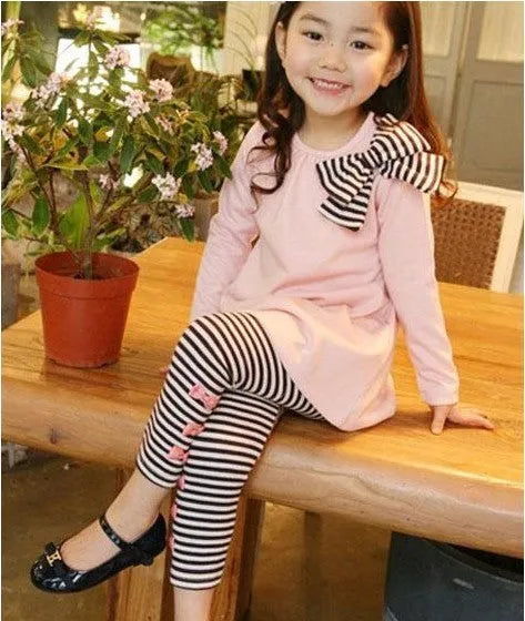 Pink girls cotton clothing set shown in sizes 110cm, 120cm, 130cm, and 140cm.