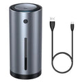 Black aluminium alloy car diffuser humidifier with air purifier on a car dashboard.