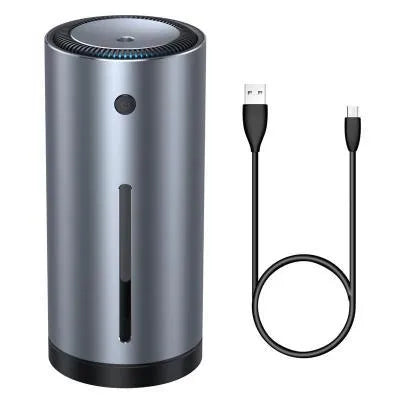 Black aluminium alloy car diffuser humidifier with air purifier on a car dashboard.