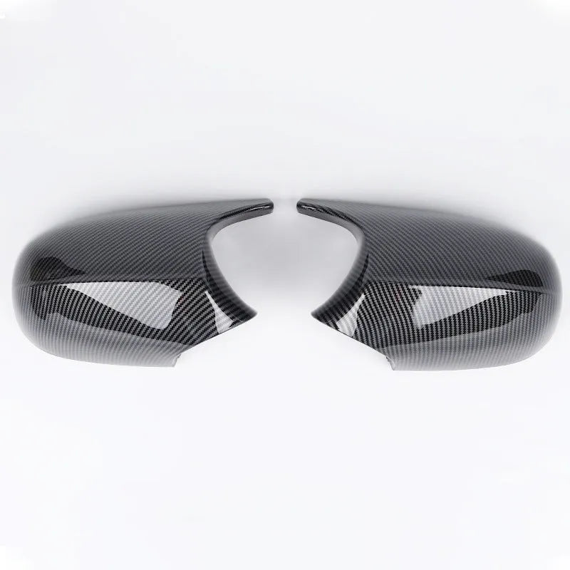 Pair of black ABS plastic rearview mirror housing shells for BMW 3 Series E90.