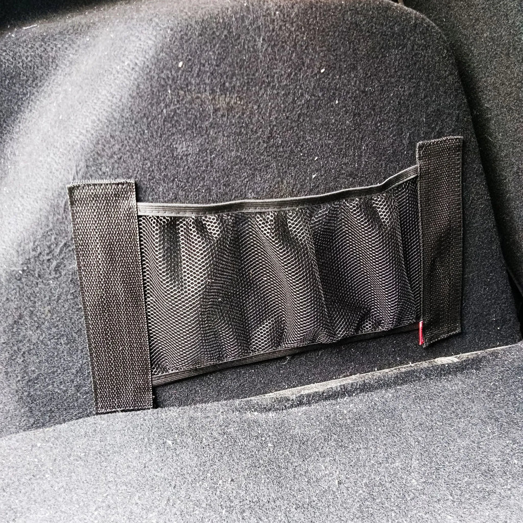Elastic polyester mesh car boot storage net shown in a vehicle trunk.