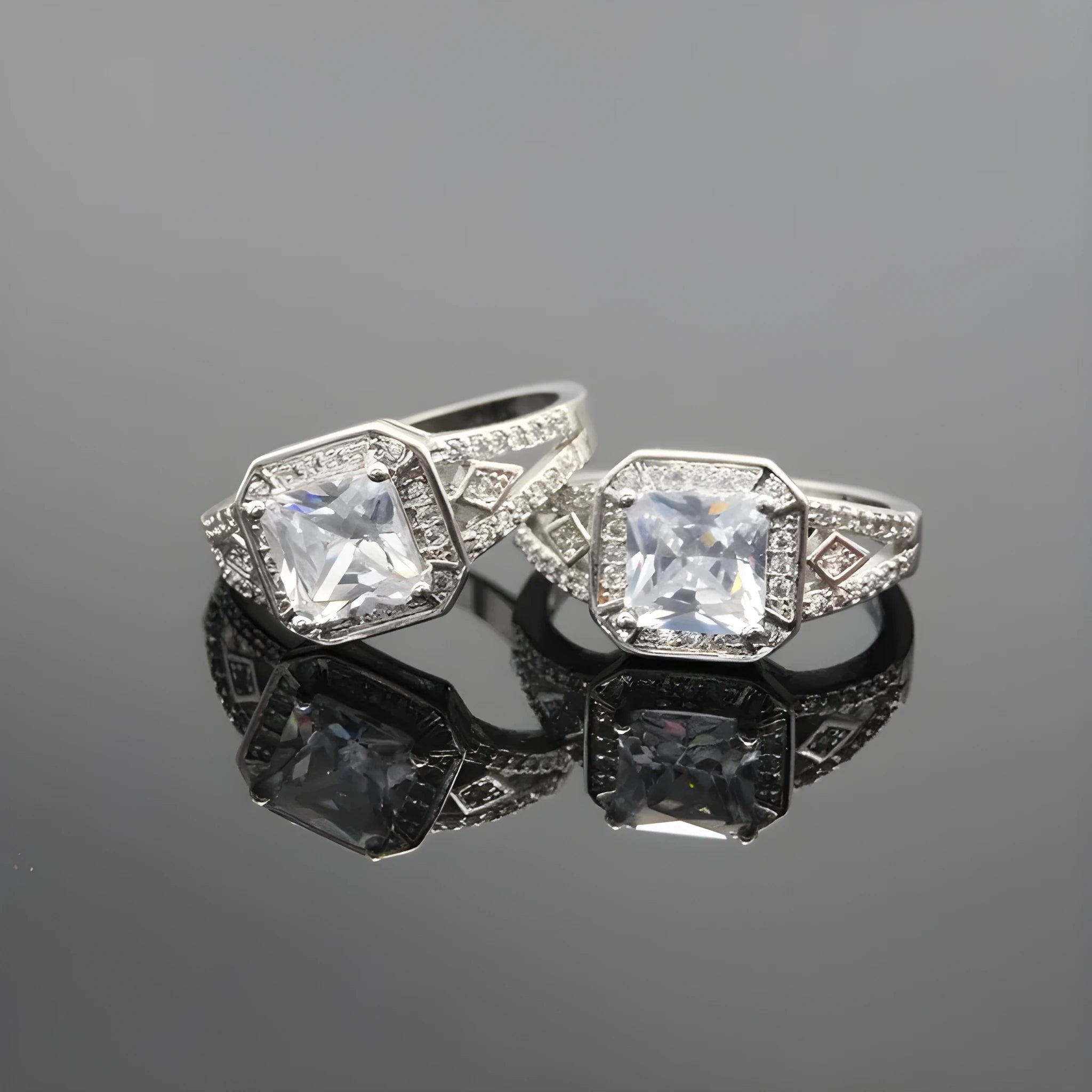 Women's platinum colour geometric zircon ring with hollow ornament design showing quadrilateral pattern