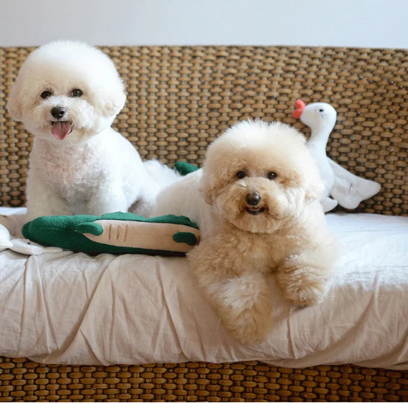 Green plush dog toy measuring 35cm long with soft texture for children's play