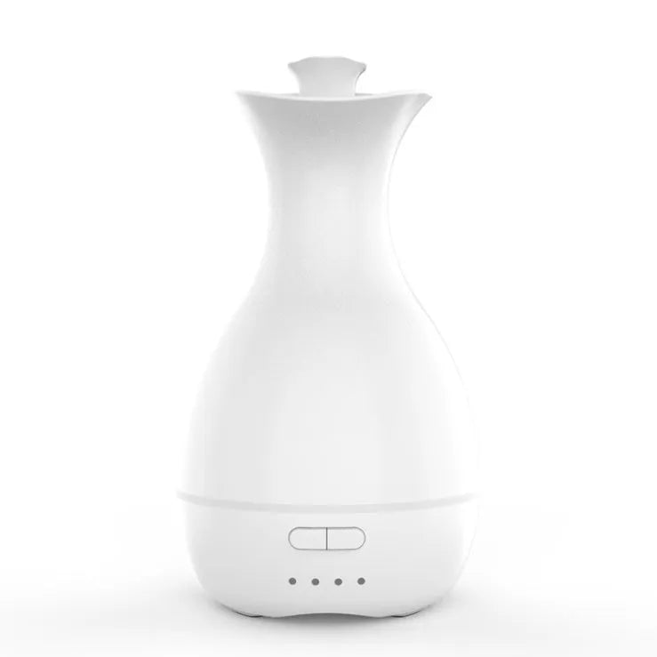 White ultrasonic humidifier and essential oil diffuser with colourful night light and 200ml water capacity