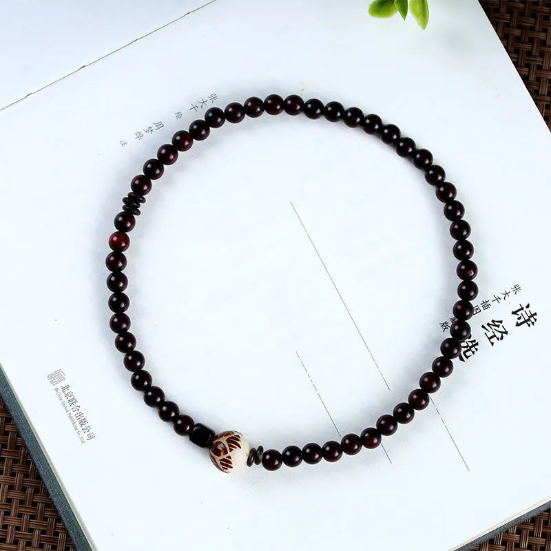 Natural rosewood double-ring bracelet with 10mm floral beads in hand-knitted construction