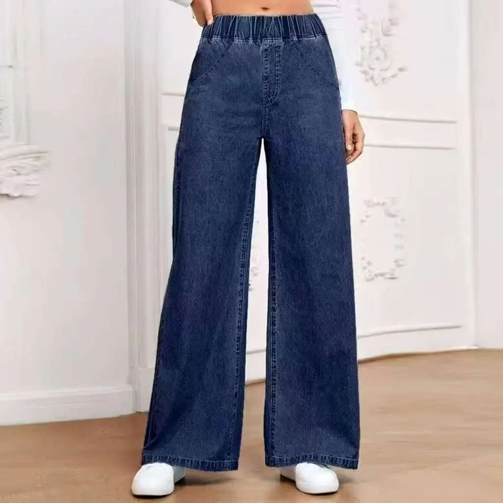 Light blue washed wide-leg denim trousers with straight leg cut and mid waist design
