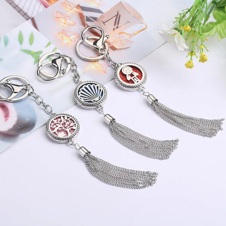Silver alloy tassel car fragrance pendant hanging on a 50cm chain with colourful scented cotton pieces