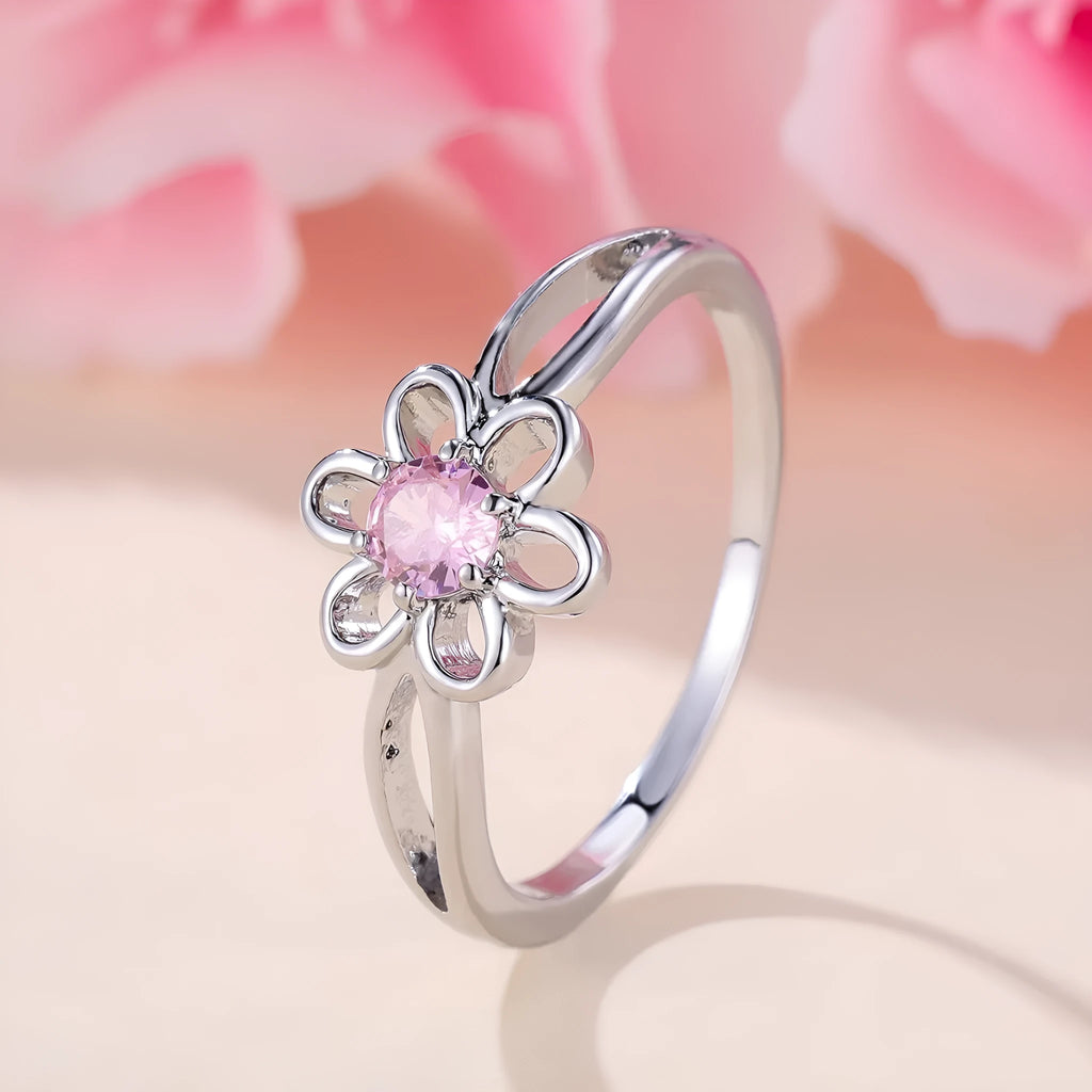 Women's flower hollow fashion ring in copper with electroplated metallic finish