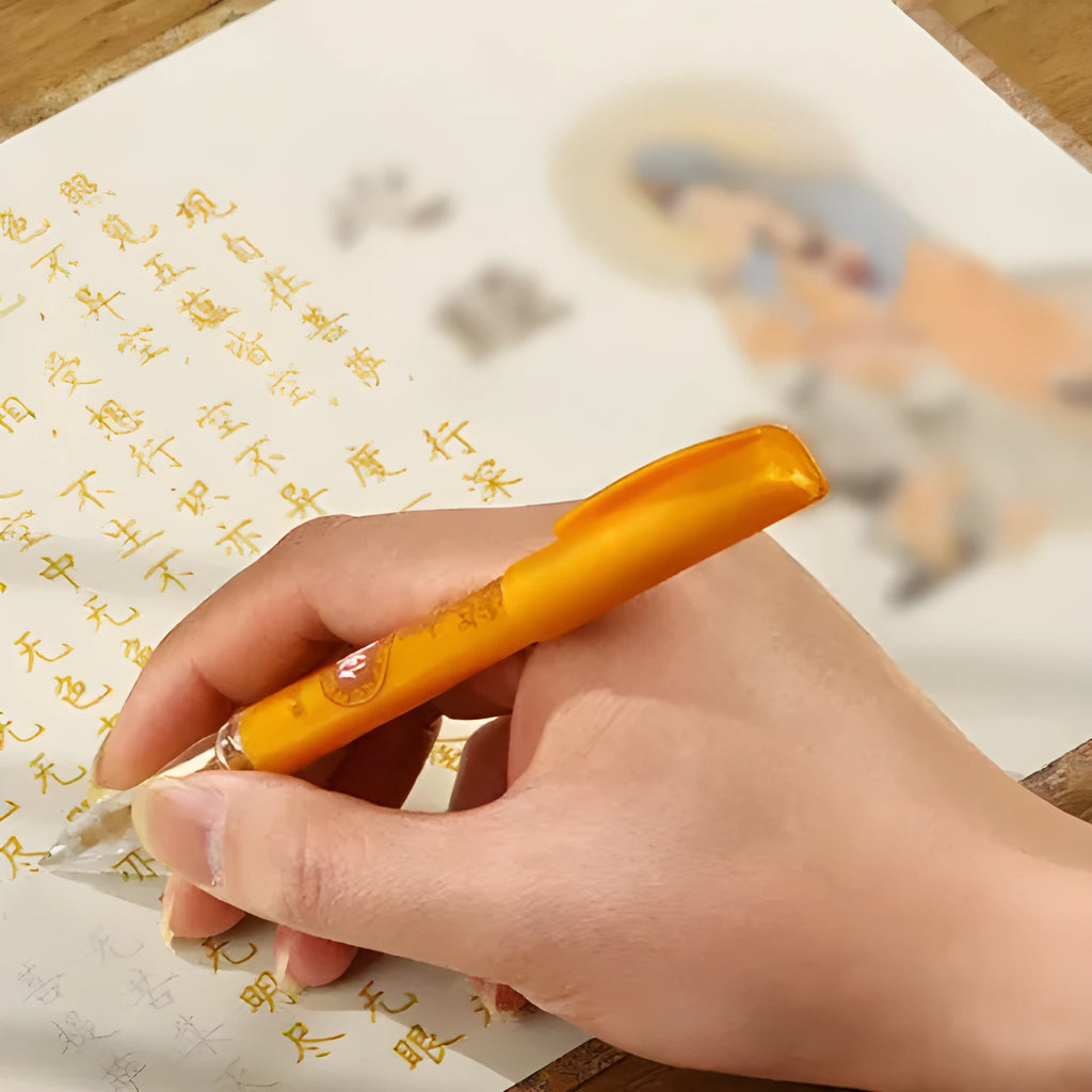 Hand copy sutra meditation set with hard-tipped pen and paper copybook open on a table